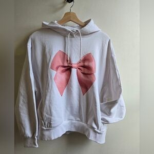 White Hoodie with Pink Bow Design